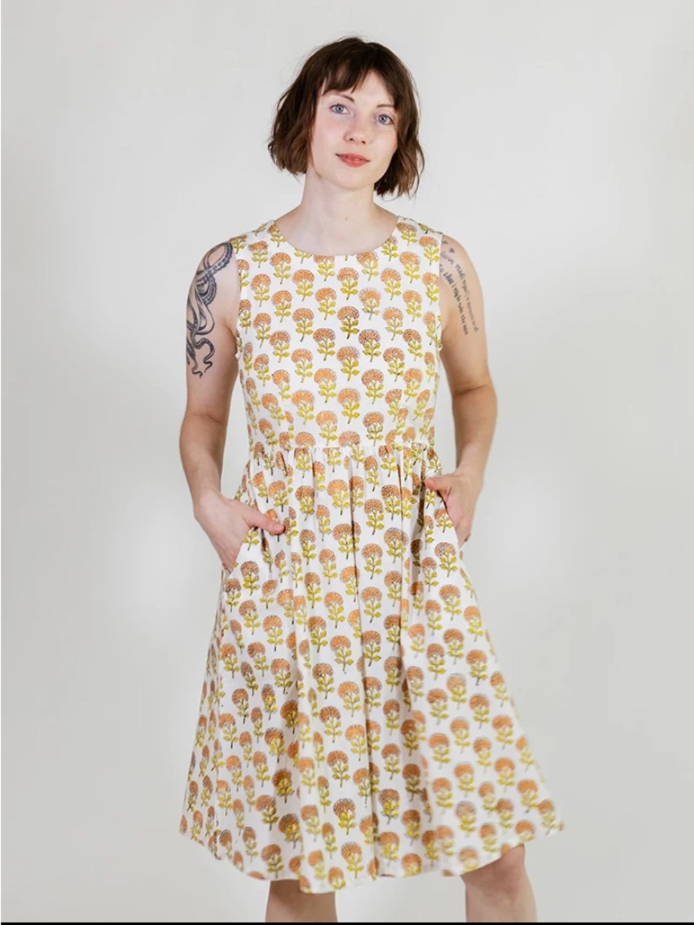 Mata Traders Sydney Sleeveless Dress in Marigold Print with pockets
